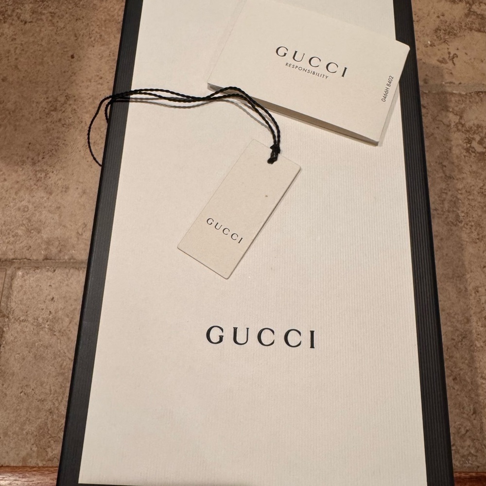 Authentic Gucci empty shoe box with tags.